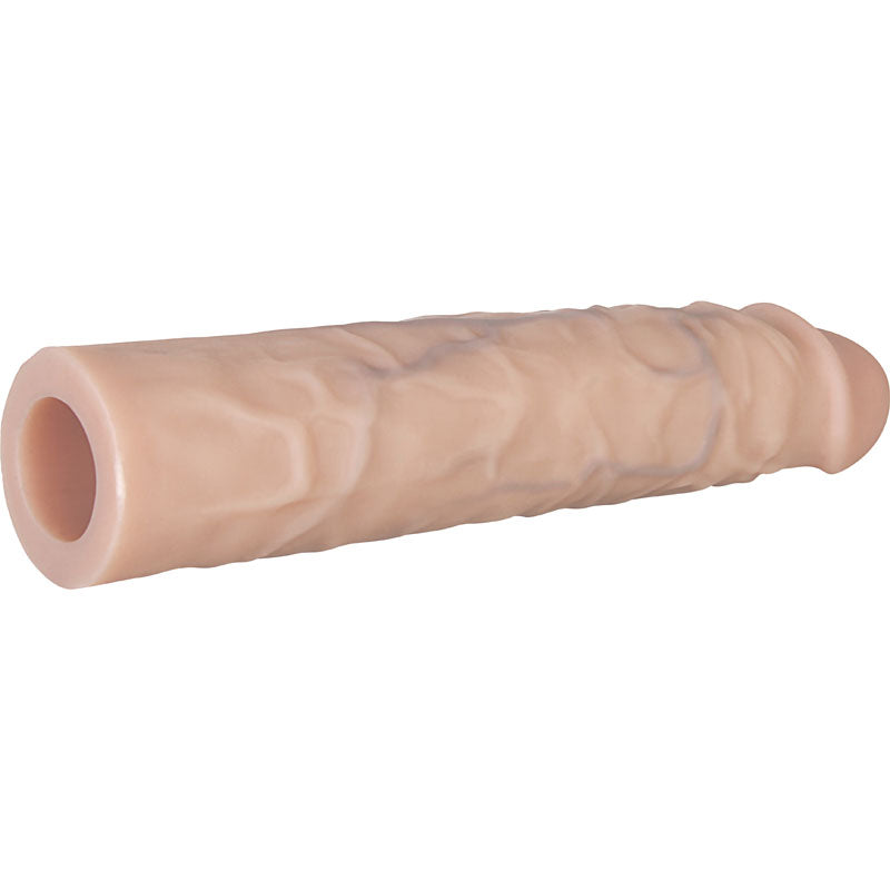 Adams 3 Realistic Extension shown in flesh tone with textured surface and hollow interior for enhancement purposes