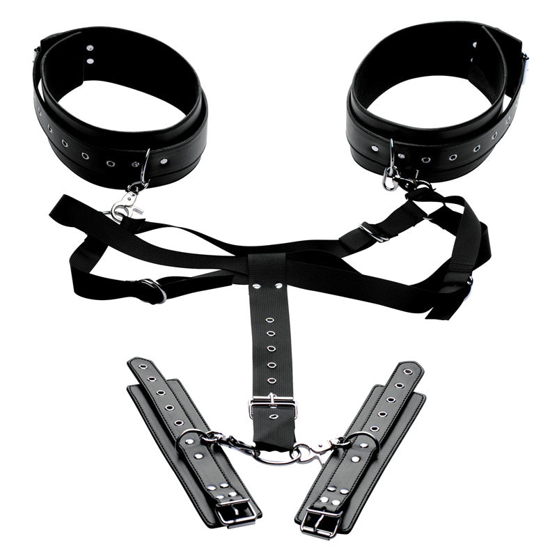 Acquire set laid flat: two padded black thigh cuffs, nylon harness straps and two buckled wrist cuffs joined by a chain