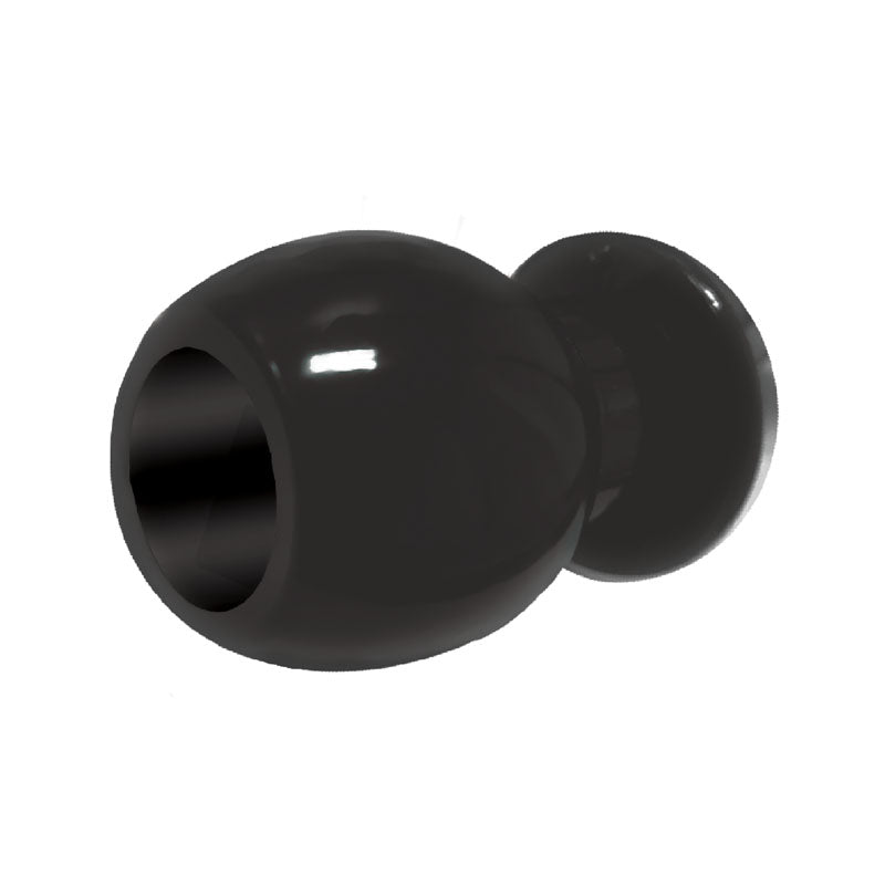 Close view of the black TPR plug lying on its side, showing the opening and rounded stopper.