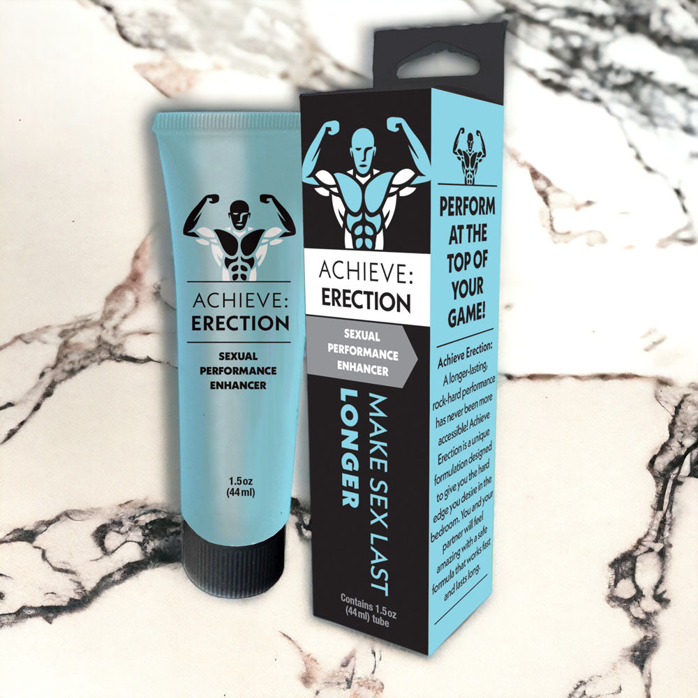 Achieve Erection performance enhancer tube and packaging box on marble surface with blue and black product design