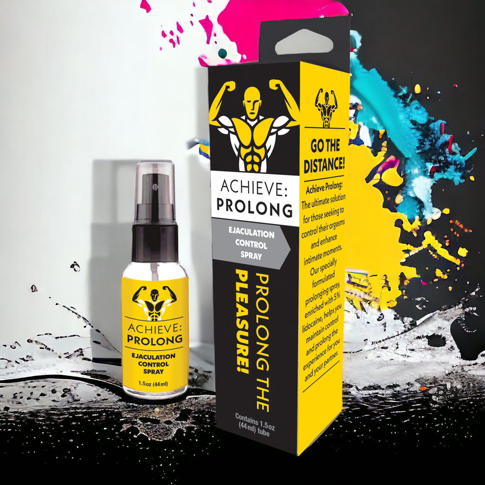 Achieve Prolong delay spray bottle and packaging box with vibrant yellow and black design on splash-painted background