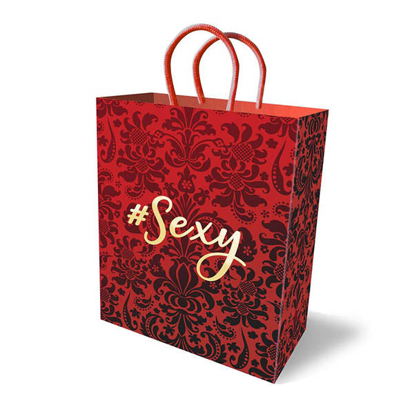 Sexy Gift Bag featuring red damask pattern with gold foil lettering and black flocking on luxury paper with woven handles