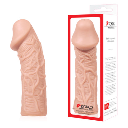 Tan flesh-toned Kokos extension sleeve with raised veins, shown beside its white and red retail box.