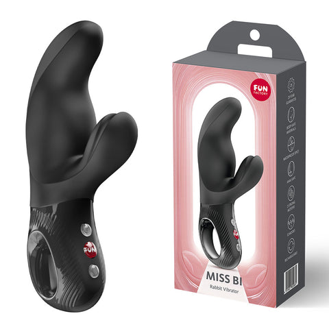 Black Fun Factory Miss Bi dual stimulator standing beside its grey and pink retail box.