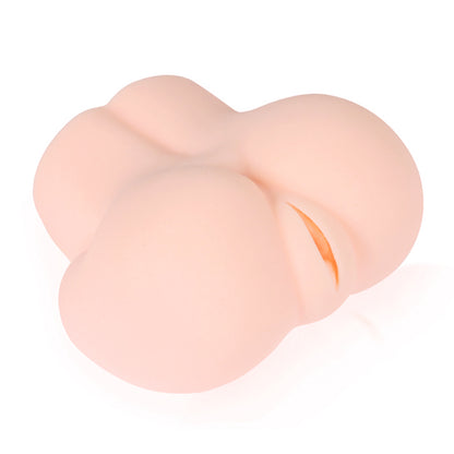 Soft peach handheld masturbator with rounded buttocks shape and a detailed vulva opening.