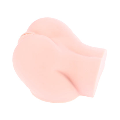 Top-down view of a pale peach stroker showing soft buttock curves and the detailed entrance.
