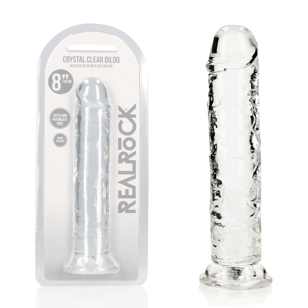 eight inch Clear dildo with packaging labeled 'Real Rock' on a white background